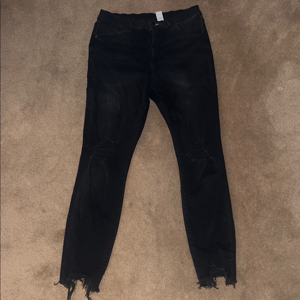 Sleek Black Distressed Skinny Jeans